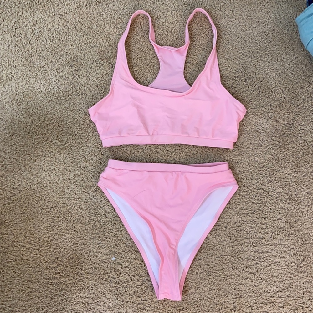 Light pink high waisted swimsuit. Size XL. Never been worn! Make offers